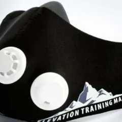 Black training mask with white valves, designed to enhance workout performance. Discover the training mask benefits for your fitness journey.
